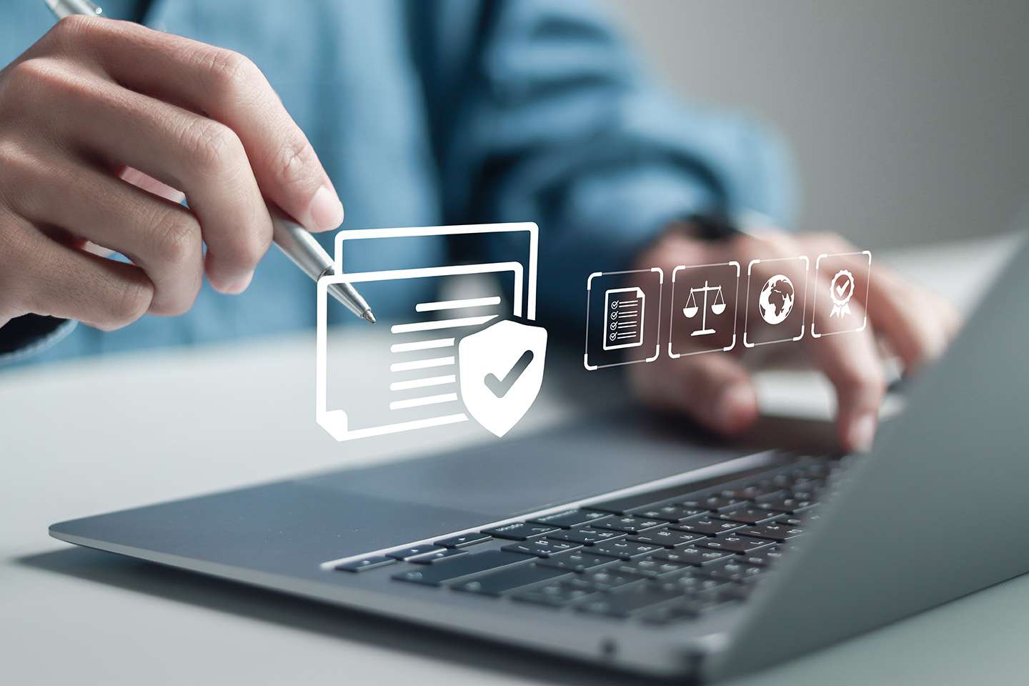 Businessman using laptop to ensure Q3 2025 payroll compliance with laws, tax regulations, and HR policies.